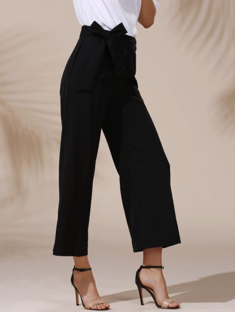 модные брюки весна лето 2022: кюлоты черные с бантом на поясе